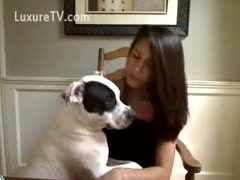 A gorgeous 19-year-old newbie is kissing her dog and taking pleasure in his licks.